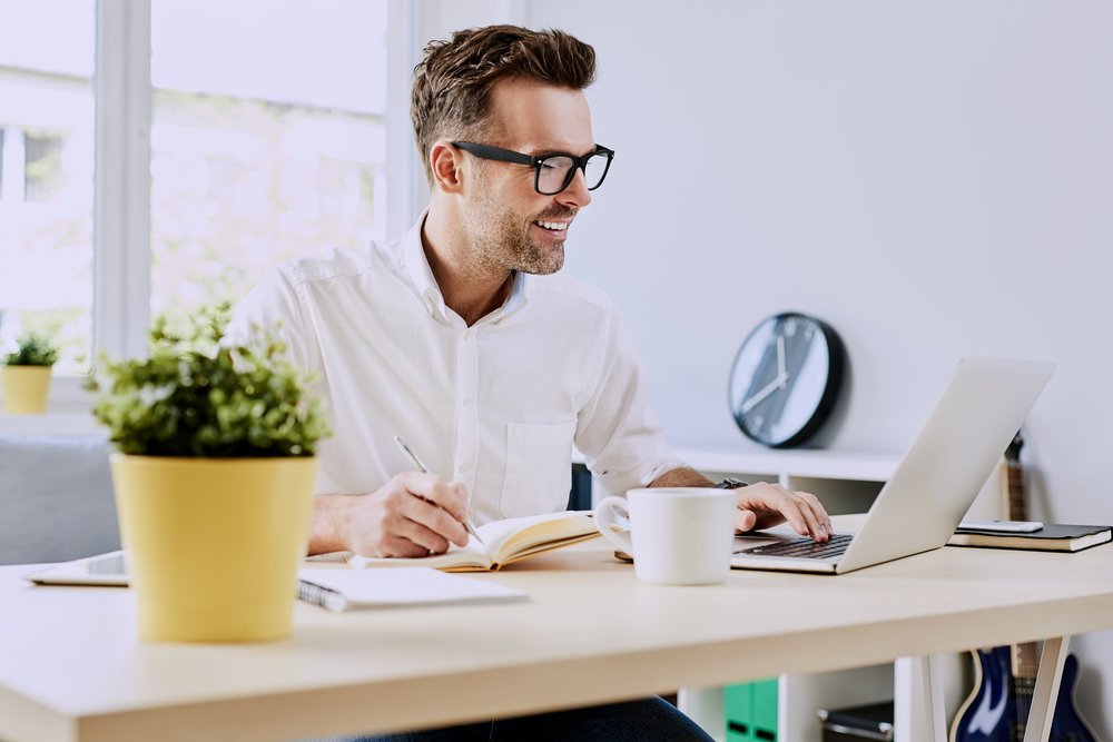 Freelancer,Working,On,Laptop,From,Home,Office
